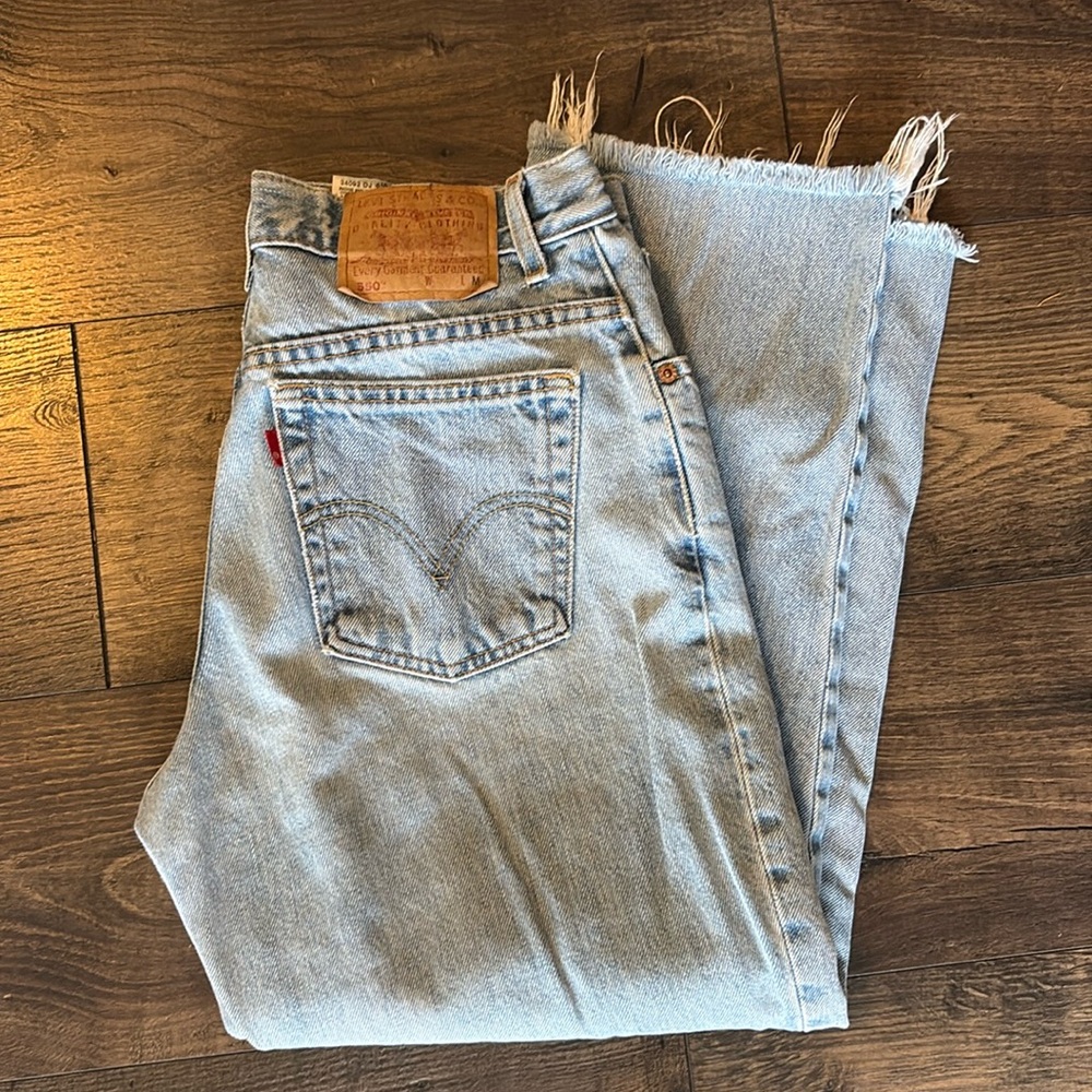 Levi’s raw hem light wash jeans